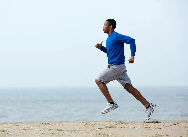 Man running on beach